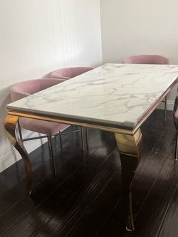 Marble Top Dining Table with Gold Legs and chairs