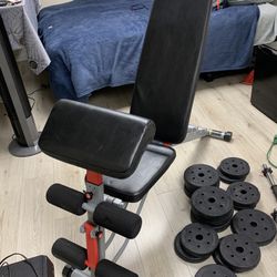 Weight Bench With Some Weights 