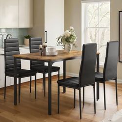 2338a  Gizoon 5-Piece Dining Table Set for 4, Kitchen Table with PU Chairs Retro Modern retro 5-piece space-saving dinette set. Features H-shaped wood