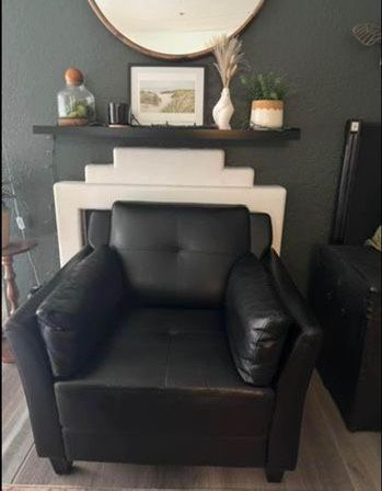 Black leather accent arm chair