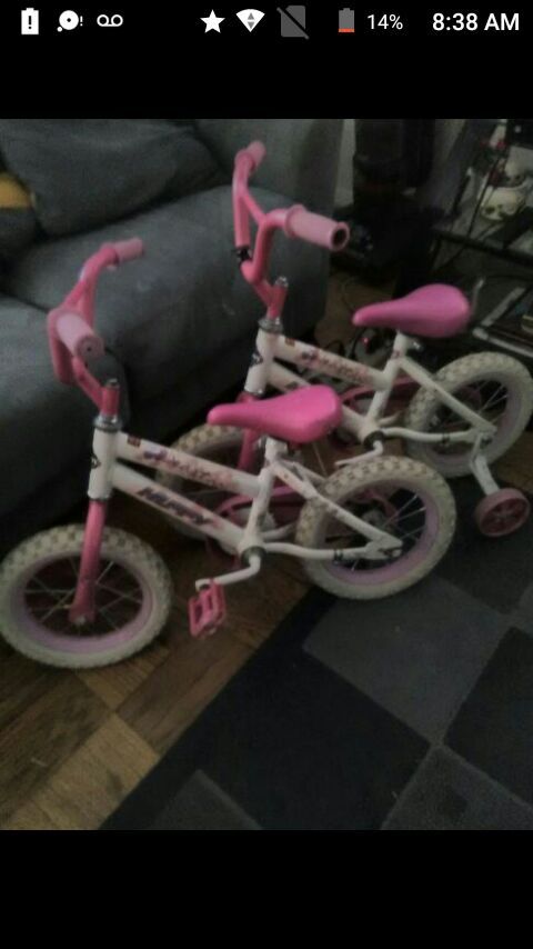 Two 12 inch girls huffy bikes one dont have training wheels