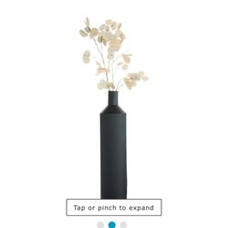 Black bottles floor vases