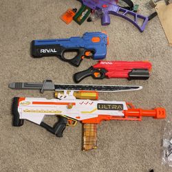 Nerf guns and lightsaber 