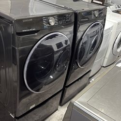 Samsung Frontload washer and gas dryer with pedestals