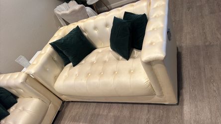 Creamy color, couches, leather used good