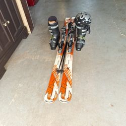 180cm K2 Apache Skis New Salomon Boots 30.5 Poles And Helmet
