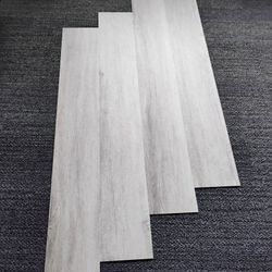 Luxury vinyl title brand new in box
Less then .50 cents a S.F.
$40 takes all.
Each tile - 7"x48"
18 pcs per box
42 sf per box
84 sf total