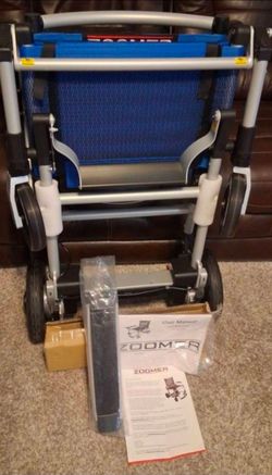 Open box Journey Zoomer Lightweight Folding Electric Blue chair joystick manuel battery & charger 24V North American Edition Never been used A