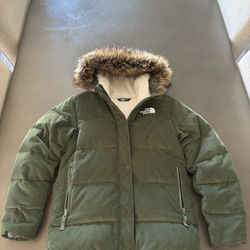 Kids The North Face coat Olive green color
