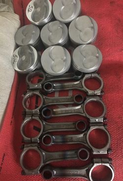 A set of Manley pistons used in good condition a set of CROWER RODS recondition with new ARP ROD bolts for small block Chevy $175.00