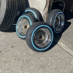 14x7 Daytons Gold on Chrome with new Tires