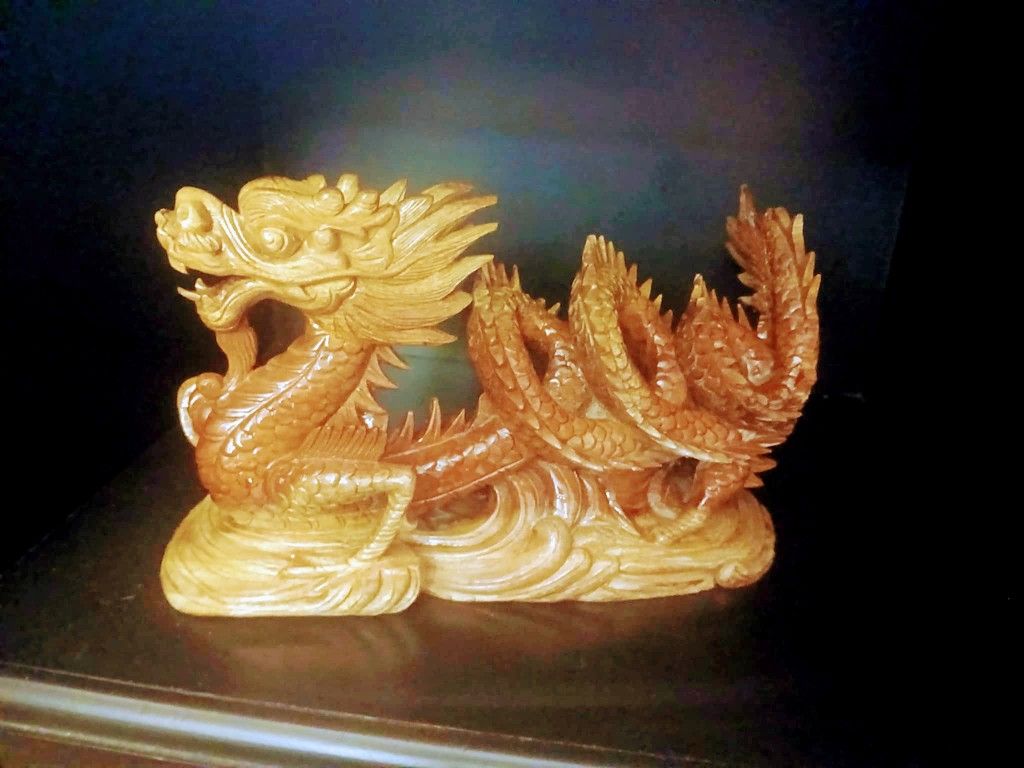 Chinese Dragon That Brings The Good Luck Carved Out Of Wood