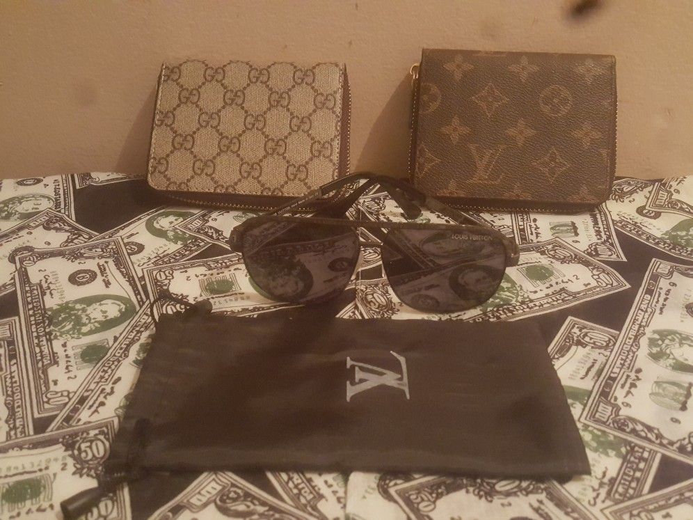 Gucci and Louis Vuitton wallets, glasses