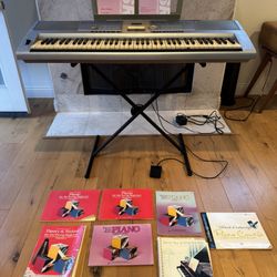 Yamaha Portable Grand DGX-203 Keyboard And Stand With Manuals And Learning Books