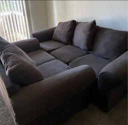 Black sofa and loveseat