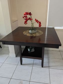 Wooden table with 6 chairs