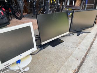 3 computer monitors