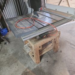 RIDGID TABLE SAW WITH STAND AND DUSTBOX