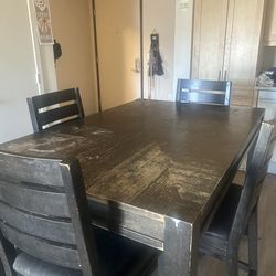 Wooden table (extends) seats six