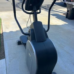 Power incline elliptical machine