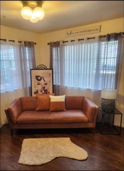 $600.  Leather Mid-Century Modern Sofa