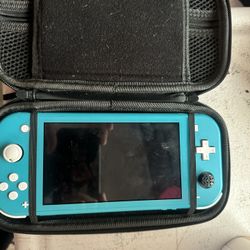 Nintendo Switch Lite With Minecraft Dungeons, Luigi’s Mansion, & Zelda