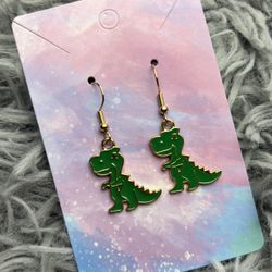 Green dinosaur earrings