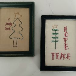 Set of 2  8”x6” vintage embroidered Christmas framed art. Dark green wood frames with Glass.