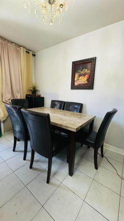 Like new real marbal Dining table W 6 chairs