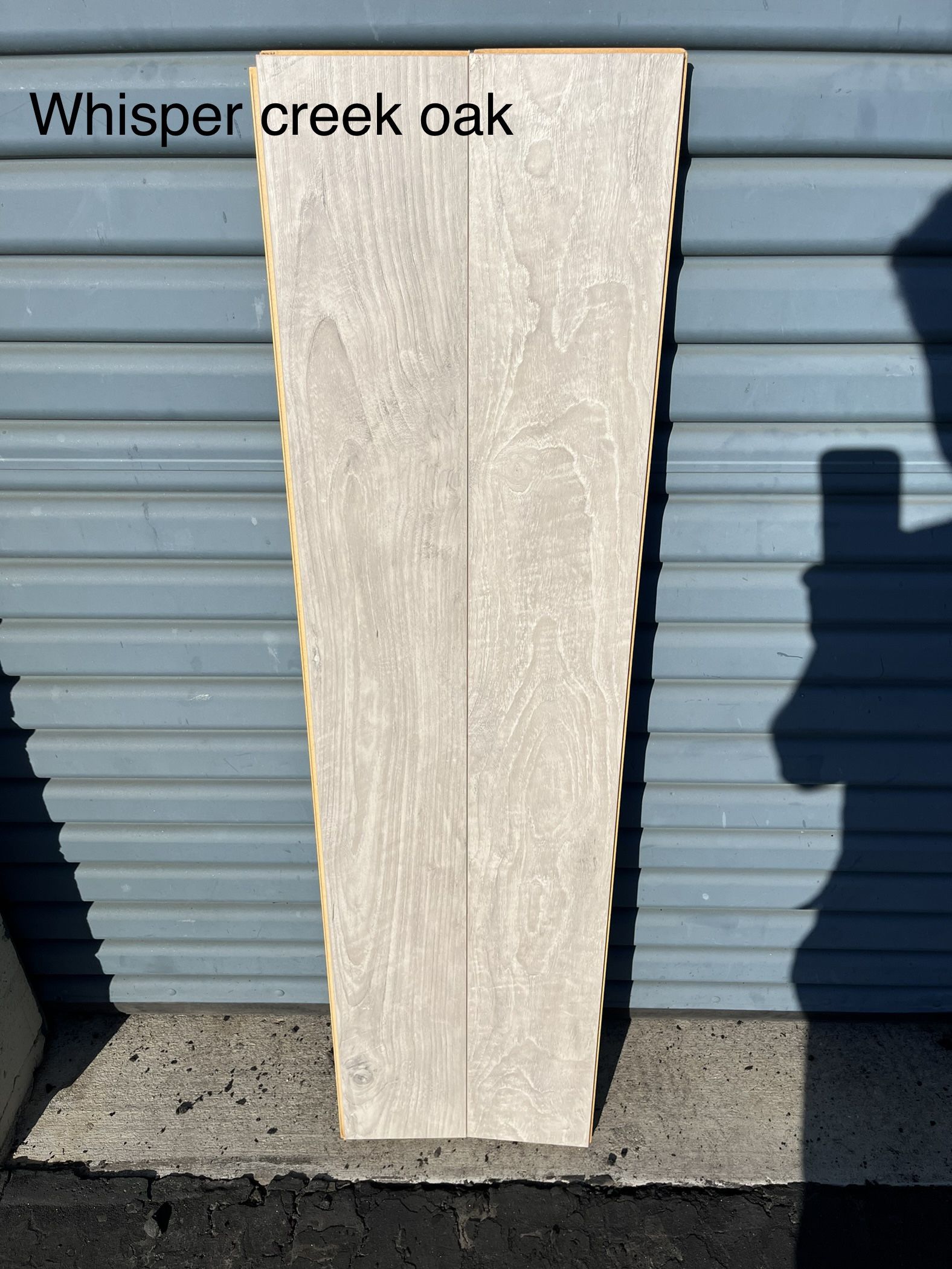 Mohawk Home Whisper Creek Oak Laminate flooring with 2mm attached pad included (18.14sq ft)