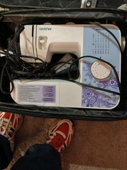 Brother sewing machine with  extras