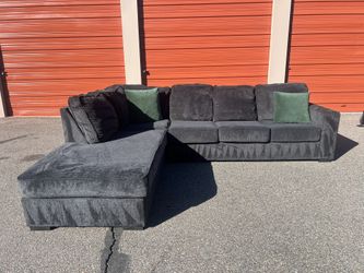 Charcoal Gray Ashley's Sectional Sofa Couch with left facing chaise