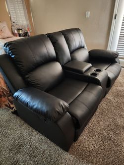 Black leather dual recliner