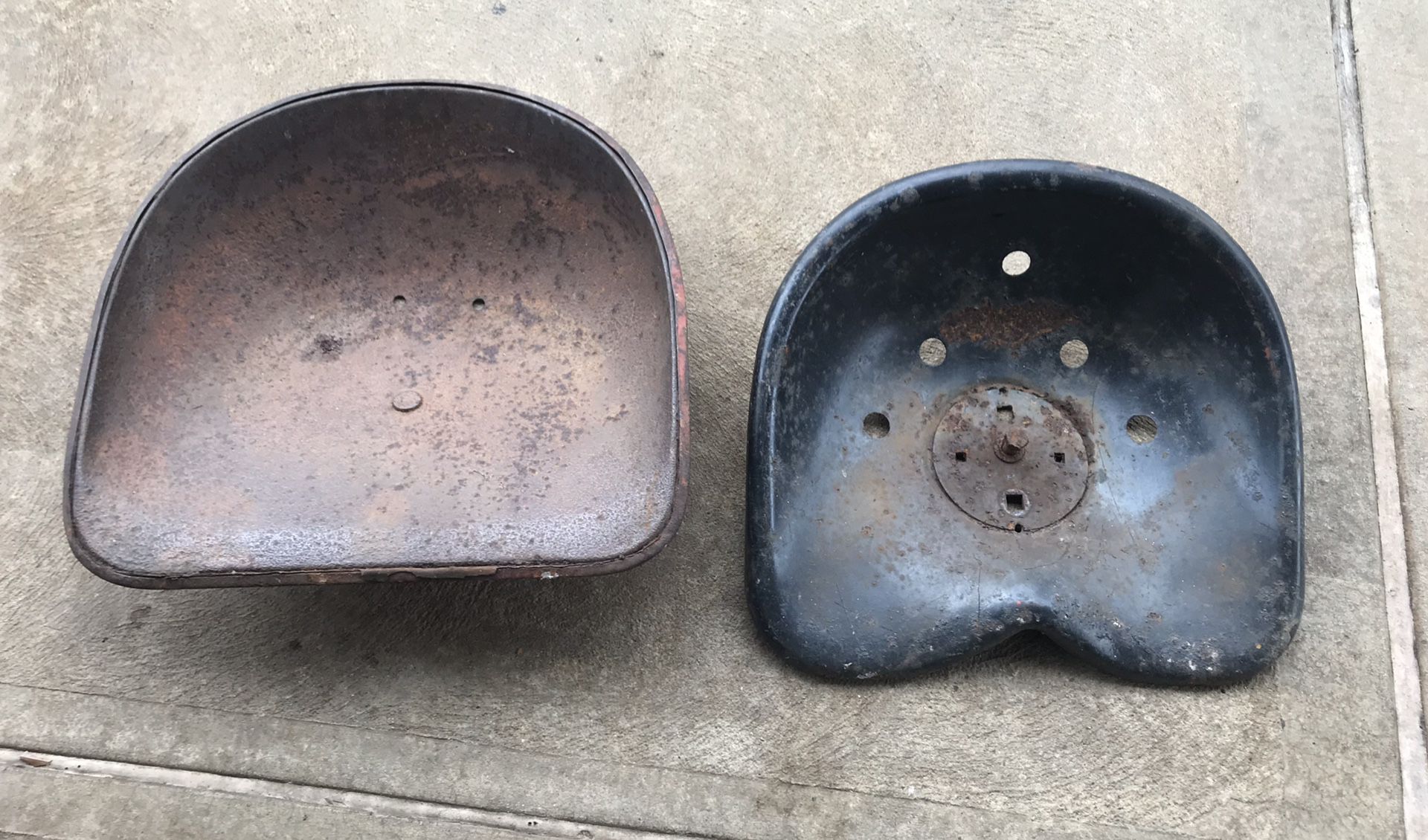 Metal tractor seats