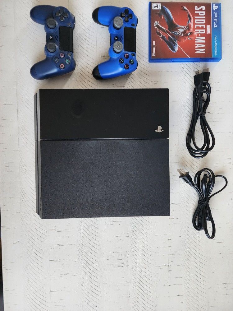 PS4 plus controllers and game