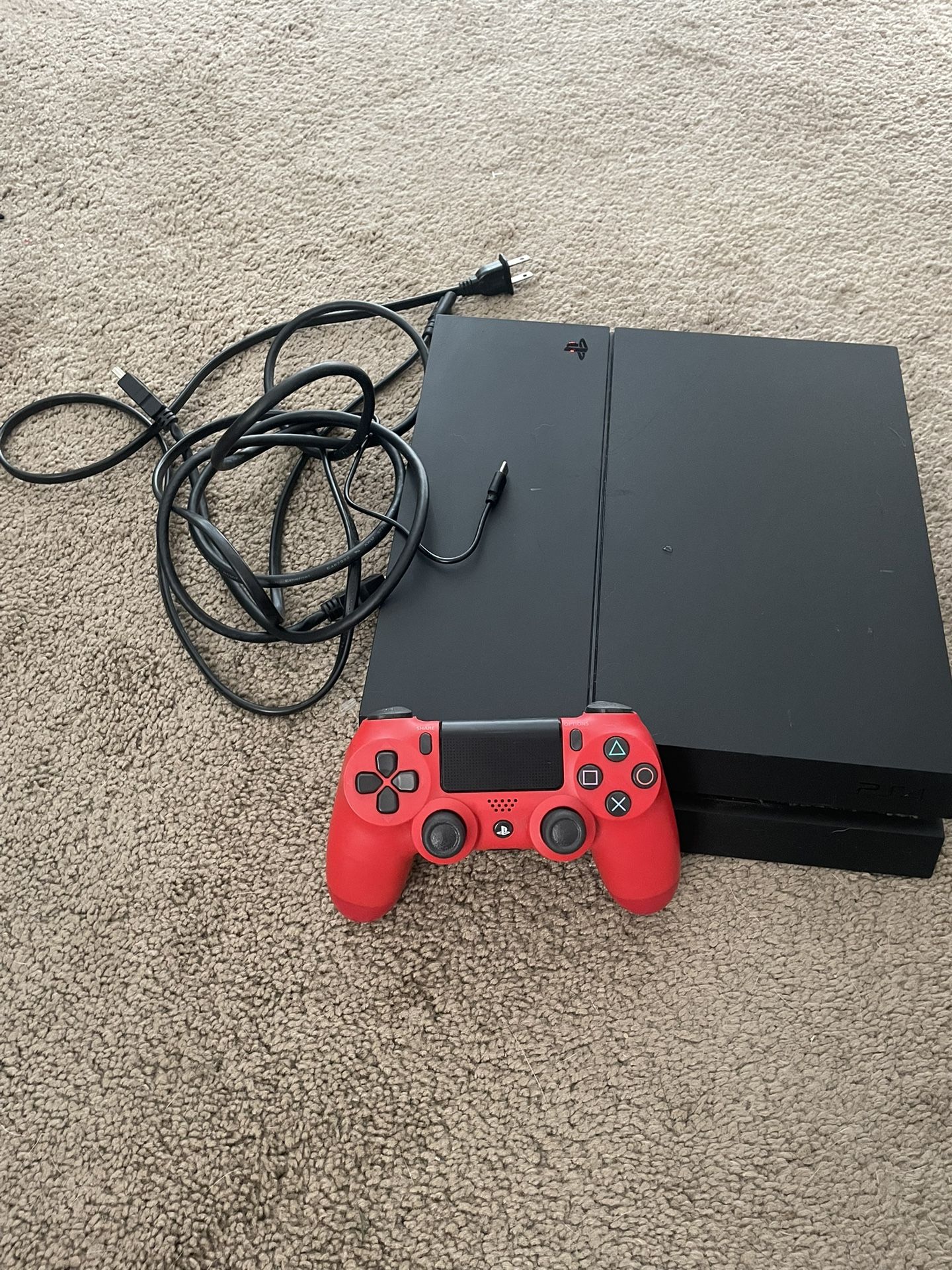 PS4 with red controller