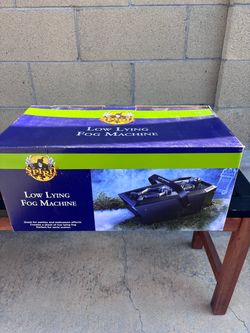 Low lying fog machine