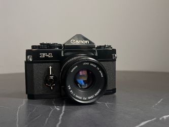 Canon F1 with lens.