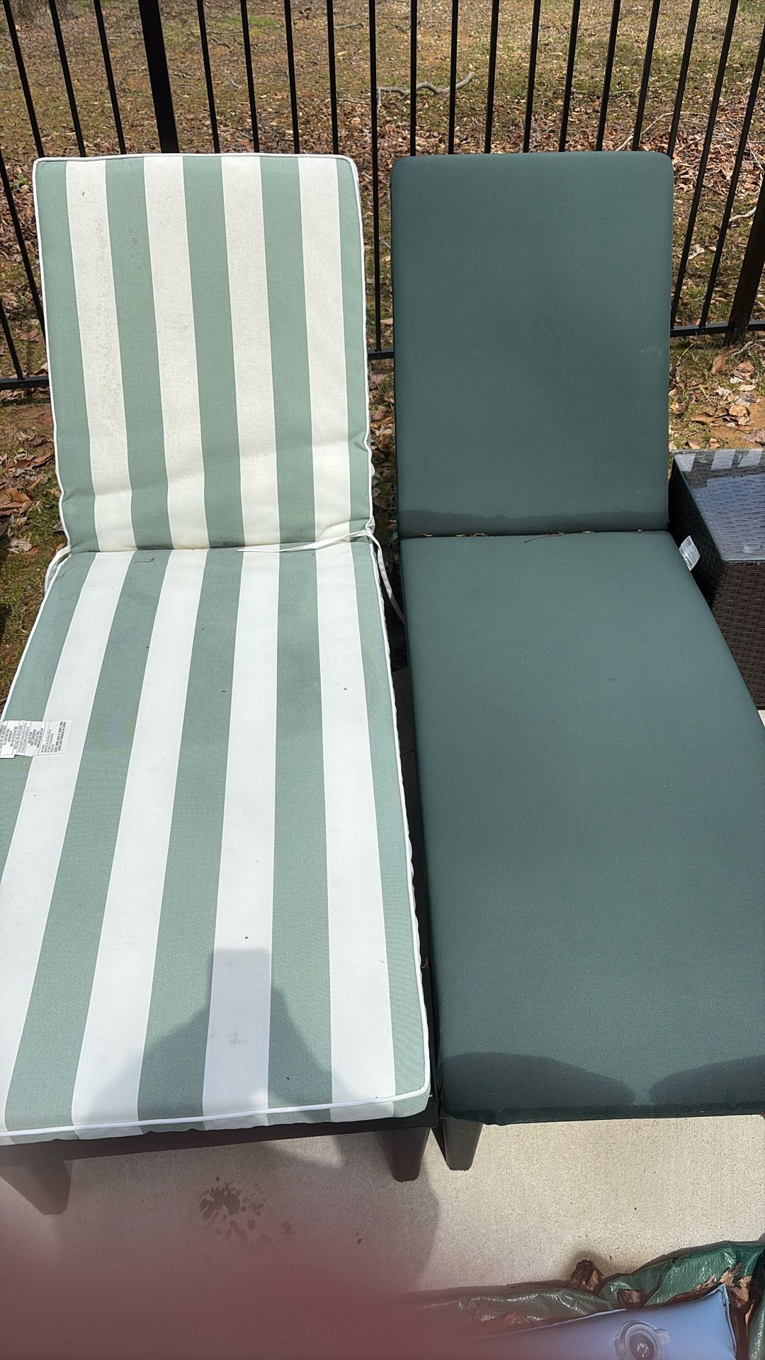 Cushions And Tan Chairs