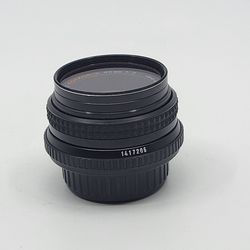 Minolta MD Rokkor-x 45mm f/2 Prime Lens.
Functionality 10 out of 10. Cosmetically, 9.9 out of 10. Please see the 
photos.
Comes with Vivitar 1A filter