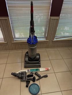 Dyson DC-17 Vacuum Cleaner with Spare Filter & Attachments