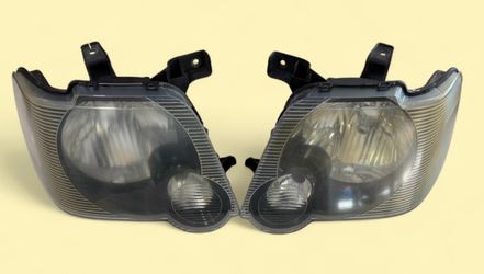 OEM Headlight Assembly For 2006-2010 Ford Explorer And Sport Track.