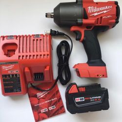 Milwaukee New Kit 1/2” High Torque Impact Wrench 18M Fuel , Battery 5ah And Charger 
