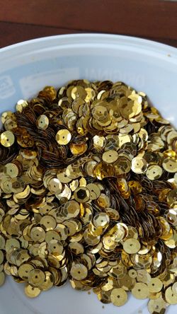 Lots of Sequin, mixed with some small yellow beads