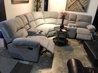 Grey Fabric Reclining Sectional with cupholders