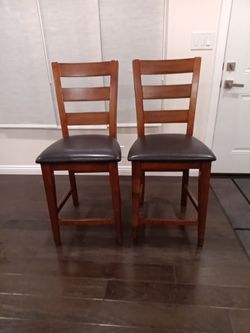2 counter height chairs, solid wood