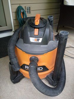 Rigid wet/dry commercial vacuum