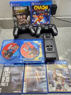 PS4 Pro 500GB Bundle w/ 2 Controllers, Charging Dock & Games