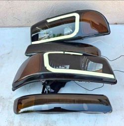 99-06 Sierra 00-06 Yukon Headlights Faros Calaveras Micas