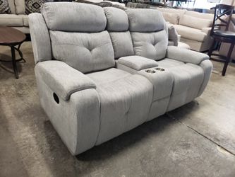 New reclining loveseat tax included delivery available